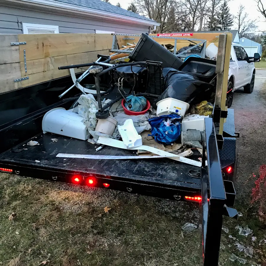 Roll-off dumpster delivered to a residential driveway in Port Royal